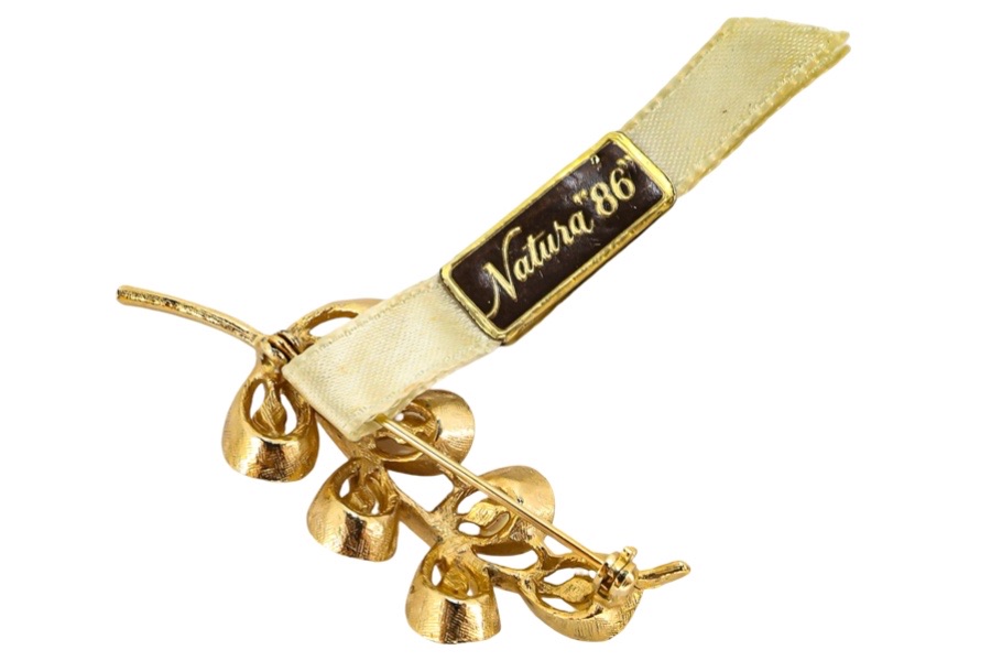 Marvella brooch natura 86' tag attached back