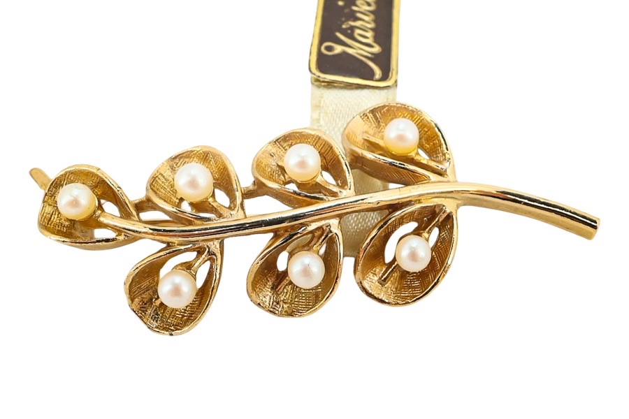 Marvella brooch natura 86' tag attached close up