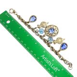 Vintage 1950s Gold Tone Blue Glass Bracelet Regal Garter Charms Germany – Rare Vintage Item