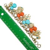 Mid Century Charm Bracelet Nautical Fishes Shells Lucite Coral And Turquoise Motifs – Vintage item