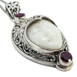 White Coral Carved Goddess Face And Ruby Pendant Necklace In Sterling Silver – Studio made / small batch item  - Estate find