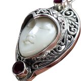 White Coral Carved Goddess Face And Ruby Pendant Necklace In Sterling Silver – Studio made / small batch item  - Estate find