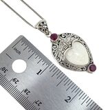 White Coral Carved Goddess Face And Ruby Pendant Necklace In Sterling Silver – Studio made / small batch item  - Estate find